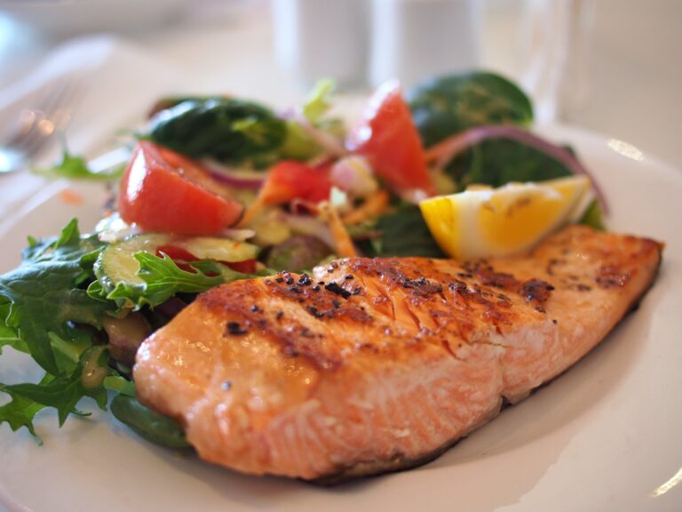 Classic Boiled Salmon with Lobster Sauce and Fresh Lemon Garnish